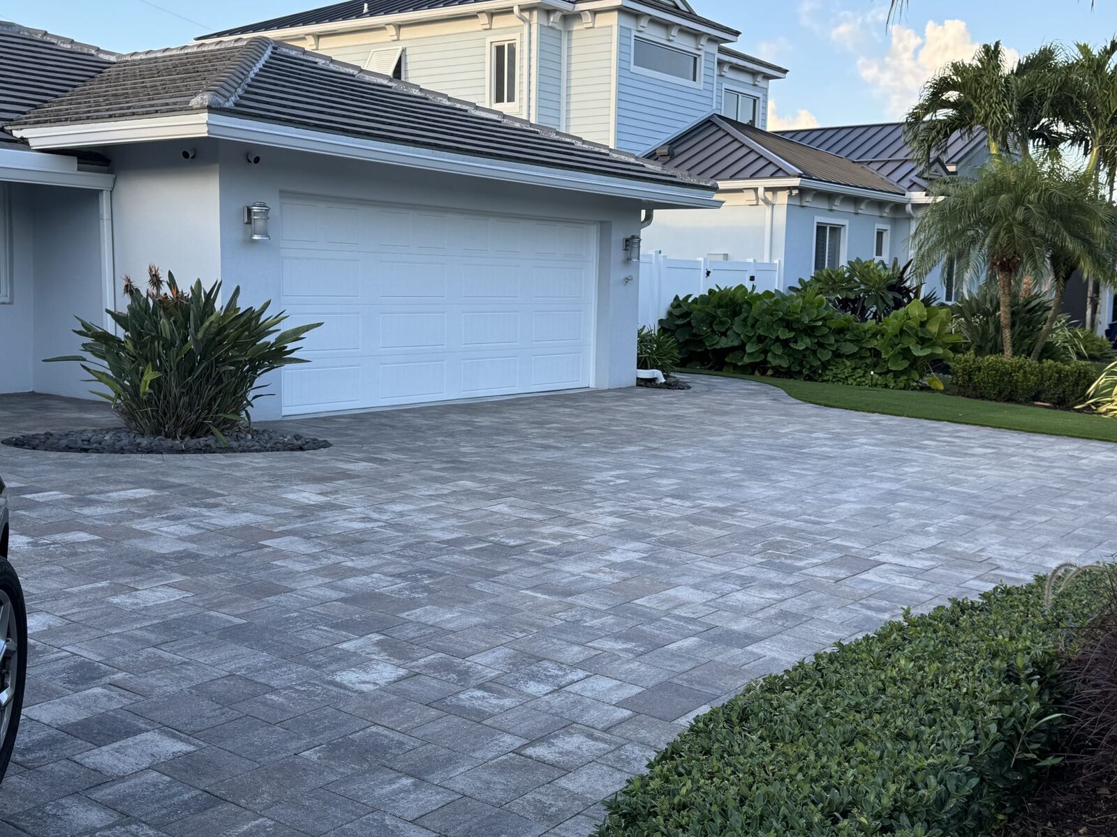 Restored and sealed paver driveway after repair